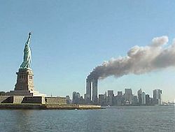 250px-National_Park_Service_9-11_Statue_of_Liberty_and_WTC_fire[1].jpg